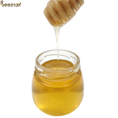 kaufen Großhandel Wubei-Blumenhonig 100% natürlicher Bienenhonig mit hellen Bernsteinfarbe 18,7% Feuchtigkeit und 73,4% Zuckerreduzierung on-line-Fertigung