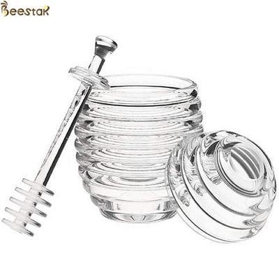 kaufen Zwei Arten transparenter Bienen-Honig-Topf und Löffel mit rührendem Rod-Kristallminihonig-Glas on-line-Fertigung