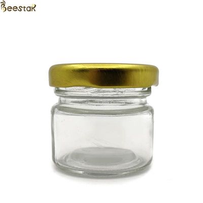 kaufen Glasgläser des honigs 25ml leeres Speicher-Glasgefäß-Massenglas Honey Bottles on-line-Fertigung