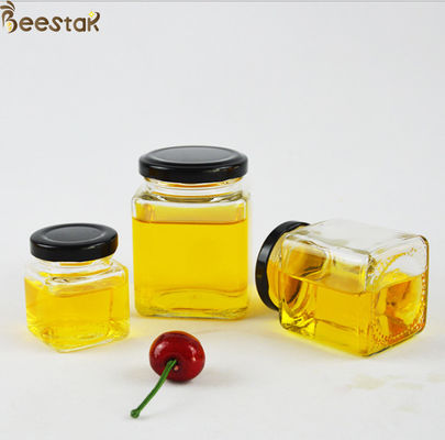 kaufen Klassische quadratische Süßigkeits-Gemüsesalat-Marmelade Honey Jar And Spoon 50ml-730ml mit Überwurfmutter on-line-Fertigung
